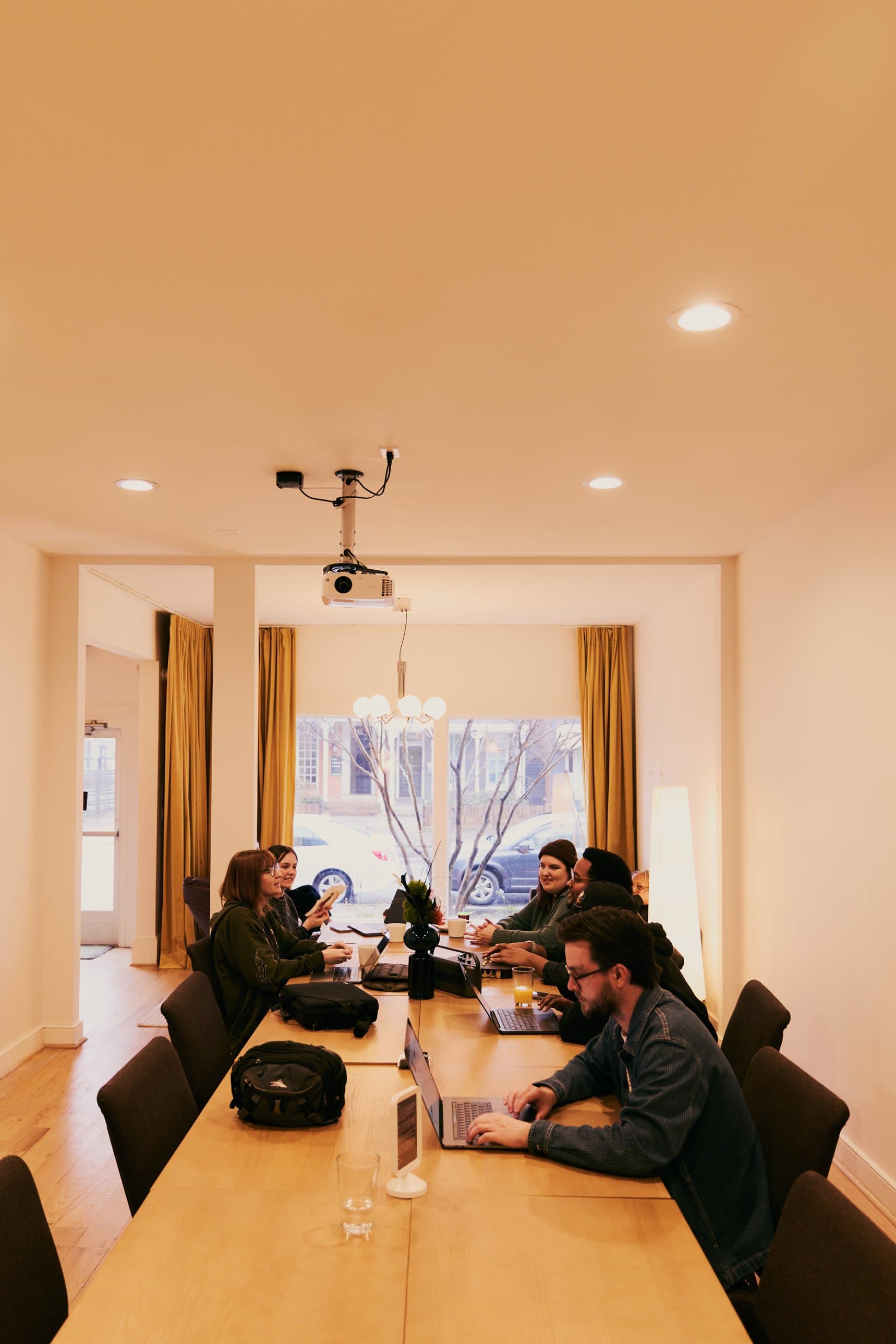 Members working at the communal desks downstairs